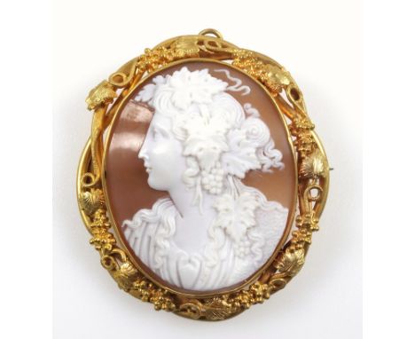 Victorian cameo pendant brooch, finely carved shell portrait of a classical lady with grapes in her hair, in gilt metal mount