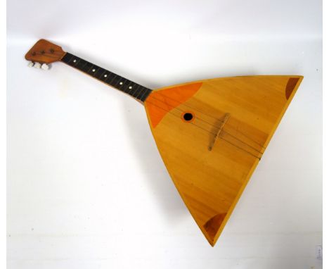 Balalaika, 2 Japanese Aulos plastic flutes, 6 other instruments, metronome, and an etching by Ray Cohen, "The Concert", signe