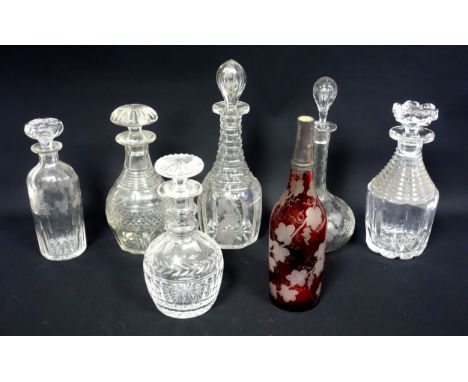 6 Victorian and later cut glass wine decanters, with stoppers, including one by Stuart, and a French ruby flash decanter with