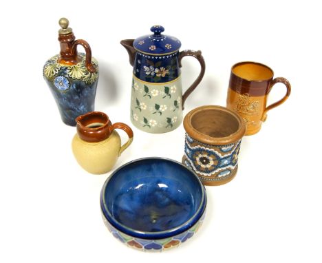 Doulton Lambeth blue mottled stoneware whisky flask, with flowers in relief, scroll handle and a Dewer's stoppe, H.23cm; hear