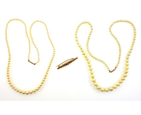 Late Victorian 9ct gold rope twist brooch, Birmingham, 1888? 2.2grs, and 2 simulated pearl necklaces with clasps stamped "9ct