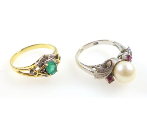 White metal ring set cultured pearl and 2 rubies, stamped "14K", size K1/2 - L, gross 4grs, and a yellow metal ring set emera