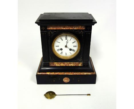 Victorian black slate and marble mantle clock, with white enamel dial, enclosing an 8 day movement striking on a single bell,
