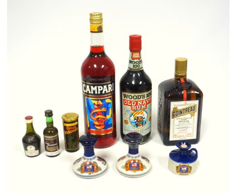 Bottle of Campari with limited edition art label by Ugo Nespolo after Leonetto Capiello, 2012, 1L, 25% vol.; Cointreau, old l
