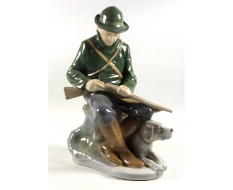 Royal Copenhagen figure of a hunter and his dog, No. 1087, H.22cm 