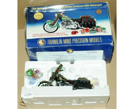 Franklin Mint, a boxed 1:10 scale B11ZY98 Limited Edition Harley Davidson Christmas 2001 Motorcycle which comes complete with