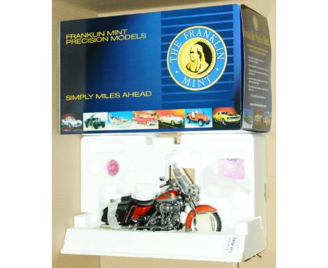 Franklin Mint, a boxed 1:10 scale Limited Edition Harley Davidson 1999 "Road King" Motorcycle. Comes with paperwork, Gloves, 