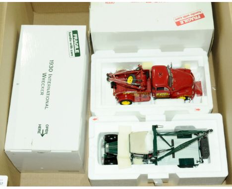 Danbury Mint, a boxed pair of 1:24 scale "Wrecker" Trucks comprising of 1953 Chevy Wrecker in Red "DM Road Service" with pape