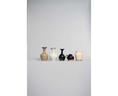 FIVE CHINESE VESSELSSONG DYNASTY AND LATERComprising: a white glazed ewer, a celadon glazed vase decorated with bands of impr