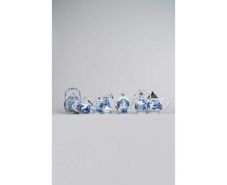 A COLLECTION OF CHINESE BLUE AND WHITE CERAMICS 17TH CENTURY AND KANGXI Comprising: three teapots and covers, a punch pot, th