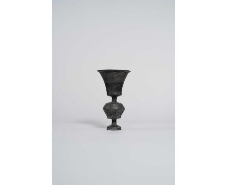 A RARE CHINESE BLACK FOOTED CUP NEOLITHIC, LONGSHAN CULTURE  The burnished earthenware body with a flared cup to the top and 