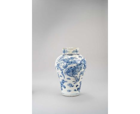 A TALL KOREAN BLUE AND WHITE 'DRAGON' VASE JOSEON DYNASTY, 19TH CENTURYThe tall baluster-shaped body decorated in underglaze 