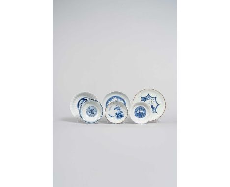 A COLLECTION OF SIX BLUE AND WHITE MOULDED PIECES 16TH CENTURY AND LATER  Comprising: a Chinese dish painted with a scroll an