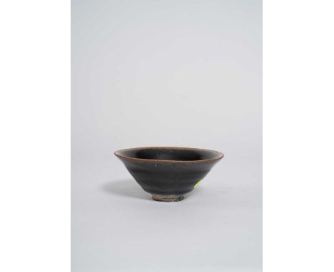 A CHINESE JIAN YAO 'IMPERIAL TRIBUTE' BOWL  SONG DYNASTY  The conical body with an unctuous black and brown glaze stopping sh