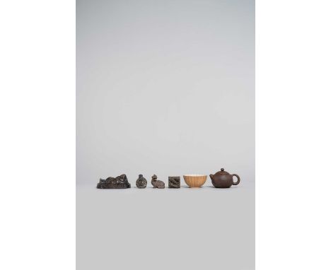 A COLLECTION OF YIXING ITEMSQING DYNASTY AND LATERComprising: a fluted bowl inscribed with a line of calligraphy, a teapot an