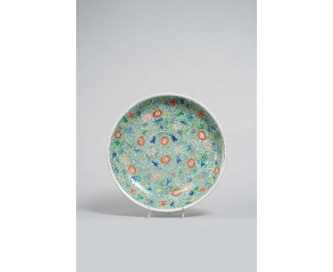 A CHINESE FAMILLE VERTE 'LOTUS' DISH KANGXI 1662-1722Painted all over with a stylised design of lotus flowerheads and leaves 