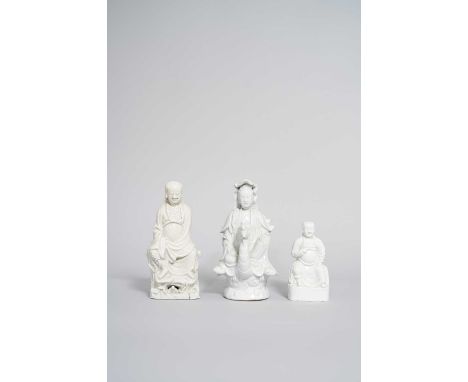 THREE CHINESE BLANC DE CHINE FIGURES  17TH CENTURY AND LATERThe largest modelled as Guanyin riding a phoenix, raised on a wai