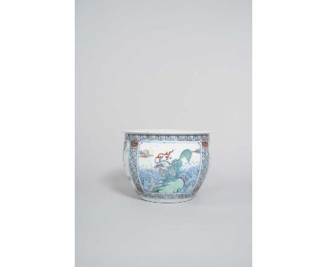 A CHINESE DOUCAI JARDINIERE 18TH CENTURYThe exterior painted with two large panels, each enclosing a qilin standing on green 