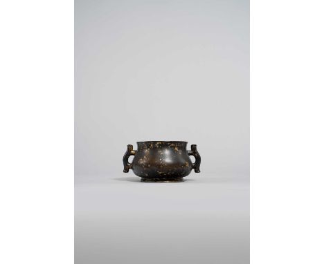 A CHINESE HEAVILY CAST GOLD-SPLASHED BRONZE INCENSE BURNER 17TH/18TH CENTURYThe circular body set with scroll-shaped side han