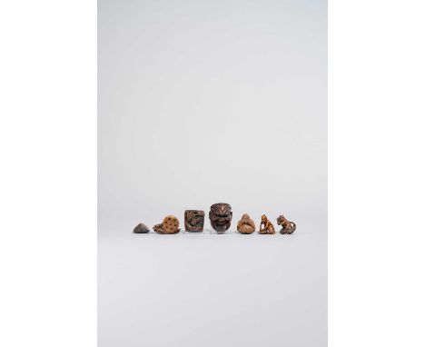 A COLLECTION OF SEVEN WOOD NETSUKE EDO AND LATER, 19TH AND 20TH CENTURY  Variously carved as a carp under lotus, the pod with