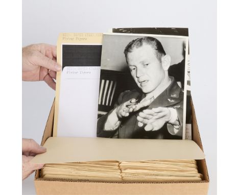 One box containing gelatin silver print or original vintage press photographic reproduction from the archives of the Star Tri