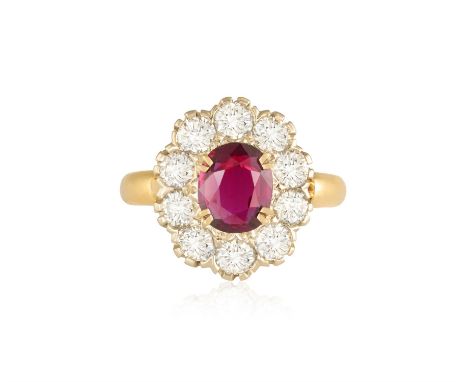 A RUBY AND DIAMOND CLUSTER RINGThe oval-shaped ruby, within a brilliant-cut diamond surround, mounted in 18K gold, diamonds a