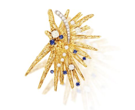 BOUCHERON: A SAPPHIRE AND DIAMOND BROOCH, CIRCA 1970Of abstract sunburst design, the textured gold rays highlighting old and 