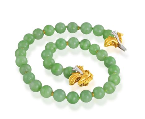 A JADEITE JADE BEAD NECKLACE WITH GOLD AND DIAMOND CLASPThe single-row of jadeite jade beads measuring approximately 11.83mm,