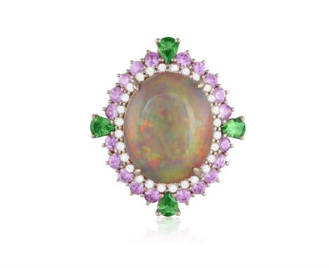 AN OPAL AND GEM-SET COCKTAIL RINGThe central oval-shaped opal cabochon within closed-back setting, within a double frame set 