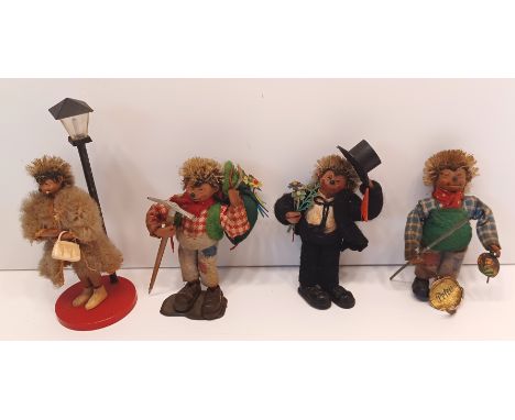 4 GERMAN 1950's STEIFF MECKI HEDGEHOG FIGURINES INC. PETER CLIMBING A MOUNTAIN ETC.