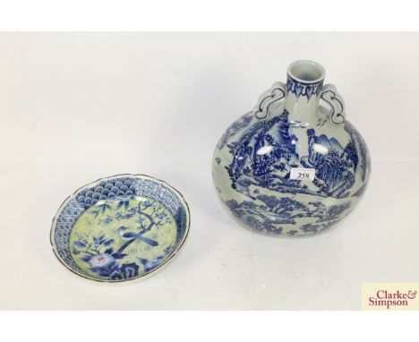 A Chinese blue and white moon flask, and a Chinese bowl with bird and floral decoration 