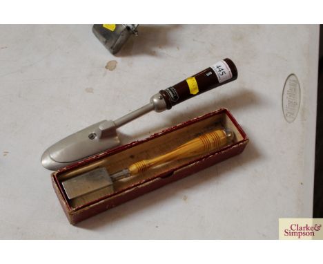 A McDonalds rotary hat iron in original box and an electric hat iron