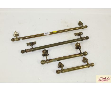 Four late Victorian brass beehive shaped double ended sash window lifts 
