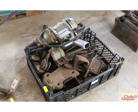 A tray box containing a selection of ring spanners, door runners, and a vintage drill