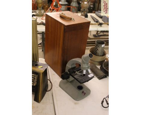A Beck of London microscope and case