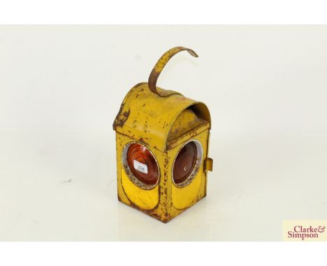A yellow road lamp 