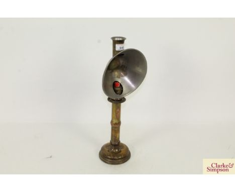 An antique brass students lamp