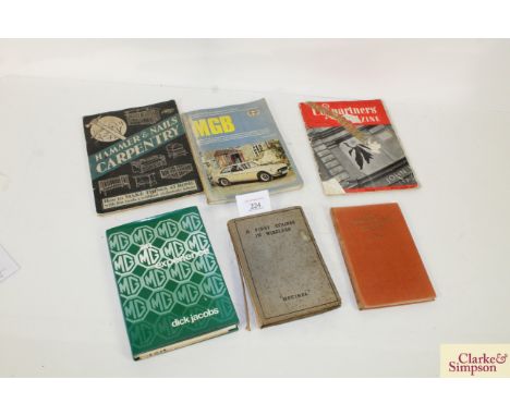 A quantity of books including a radio training manual "A First Course in Wireless", books and magazines on MGB and MG