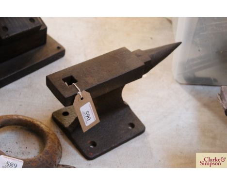 A small iron bench anvil