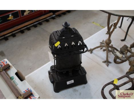 An 1890 Wright &amp; Butler lamp with radiator cover