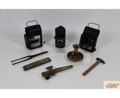 A pair of cart lamps; a single lamp; a brass ejector chamber stick; a brass barrel tap etc.