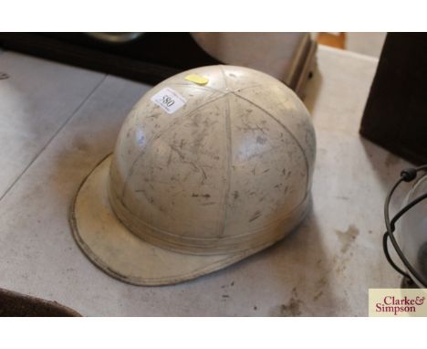 A vintage motorcycle crash helmet