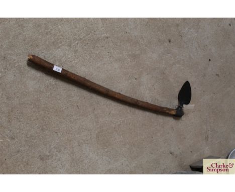 A short handled adze