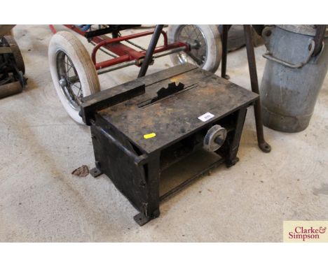 A small belt driven saw bench
