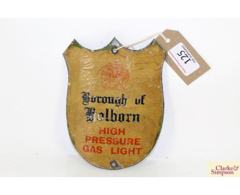 A shield shaped "Borough of Holborn High Pressure Gas Light" sign