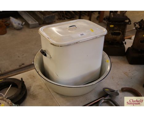 A vintage enamel bread bin and an enamel wash bowl