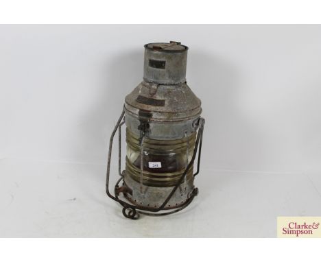 A large galvanised ships mast head light