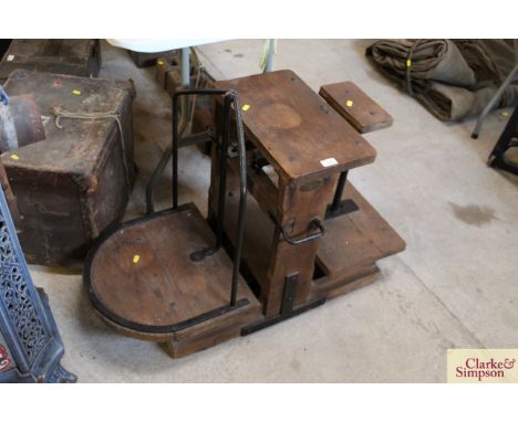 A set of vintage wooden and iron potato scales by the Isle of Ely Scale Co.