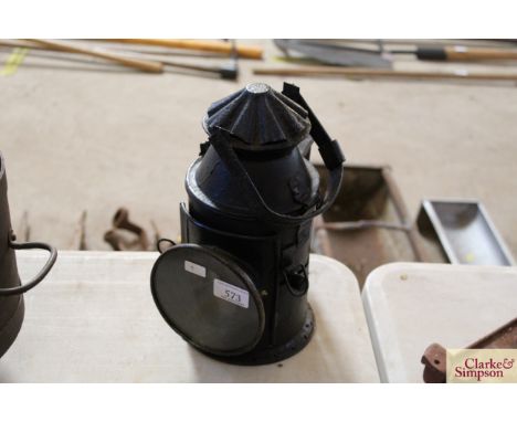 An old railway signal lamp