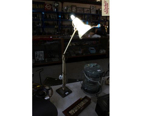 A vintage Angle Poise lamp with two step base 
